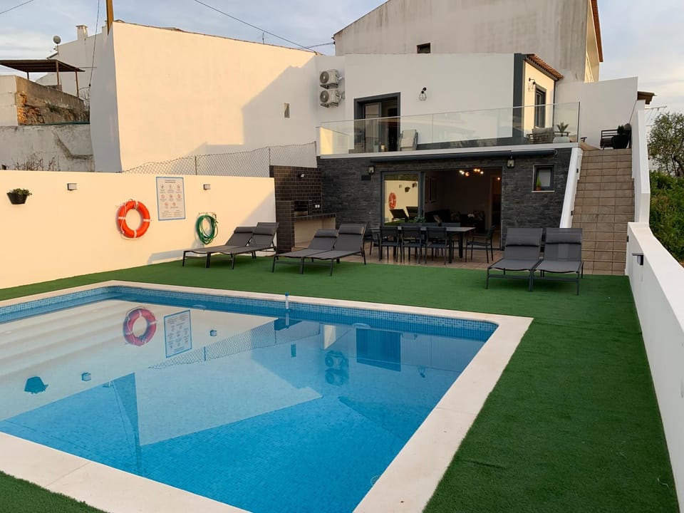 Property building, Patio, Off site, Day, Pool view, Swimming pool, sunbed