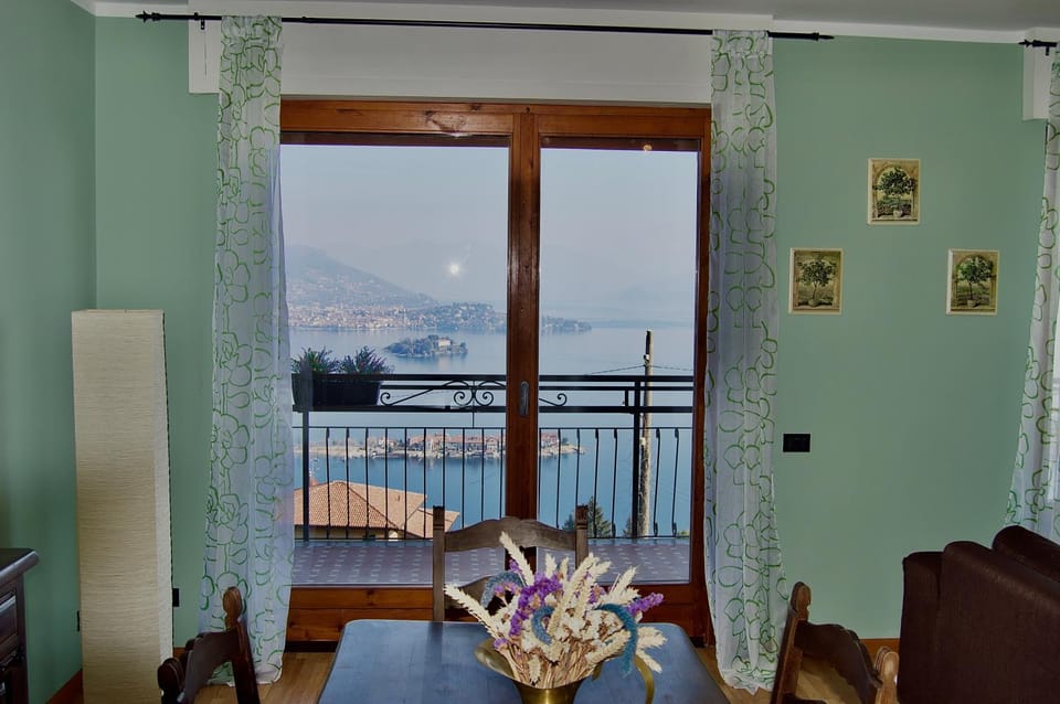 Living room, Seating area, Dining area, Lake view, Mountain view