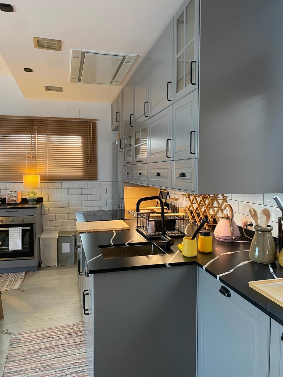 Kitchen or kitchenette, dishwasher, stove, toaster