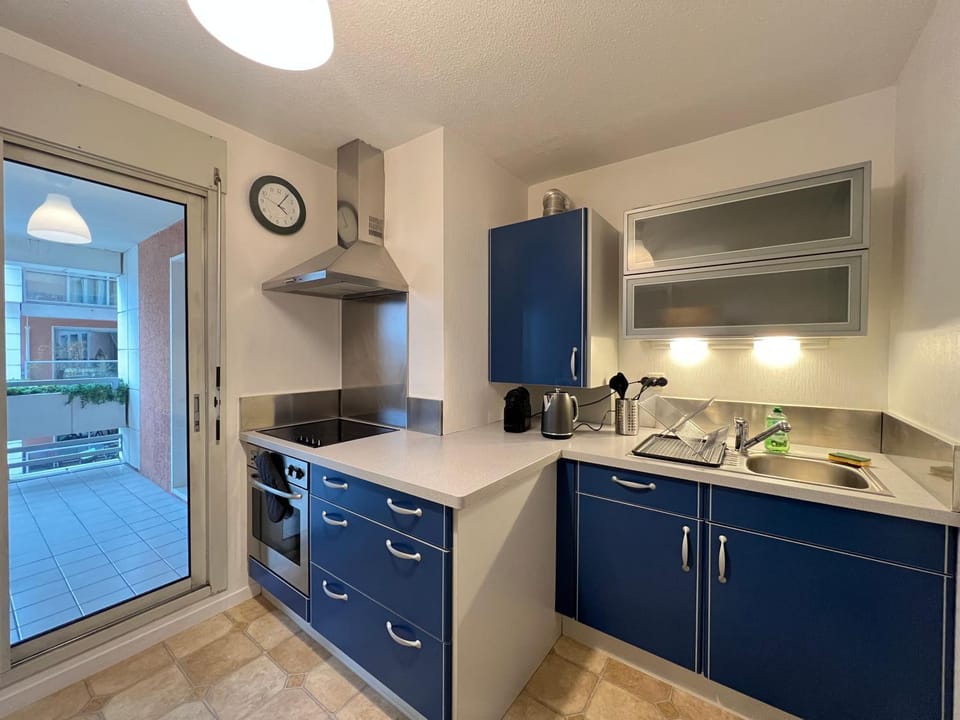 Kitchen or kitchenette, stove, kitchen