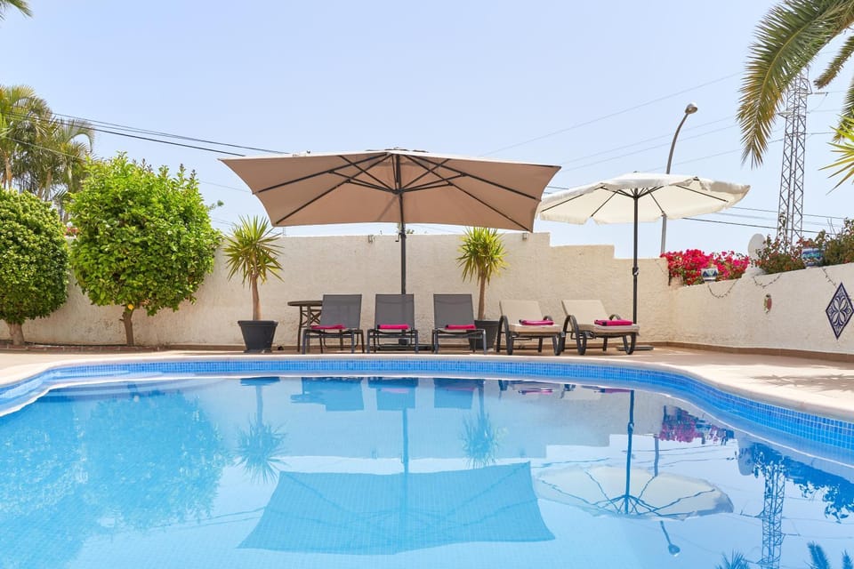 Property building, Living room, Swimming pool