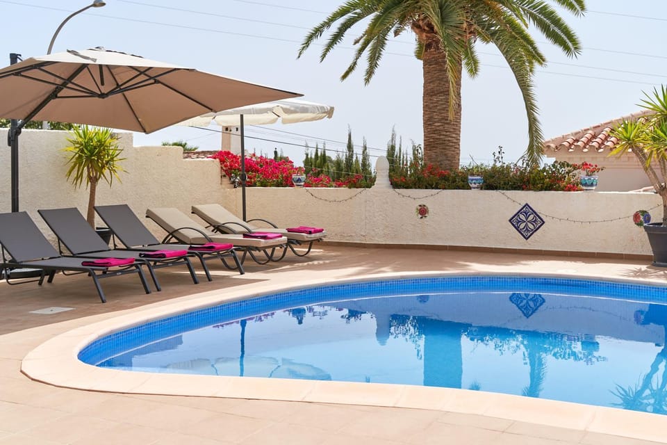Property building, Living room, Swimming pool
