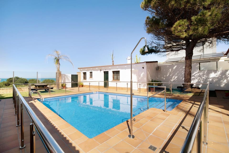 Property building, Living room, Swimming pool