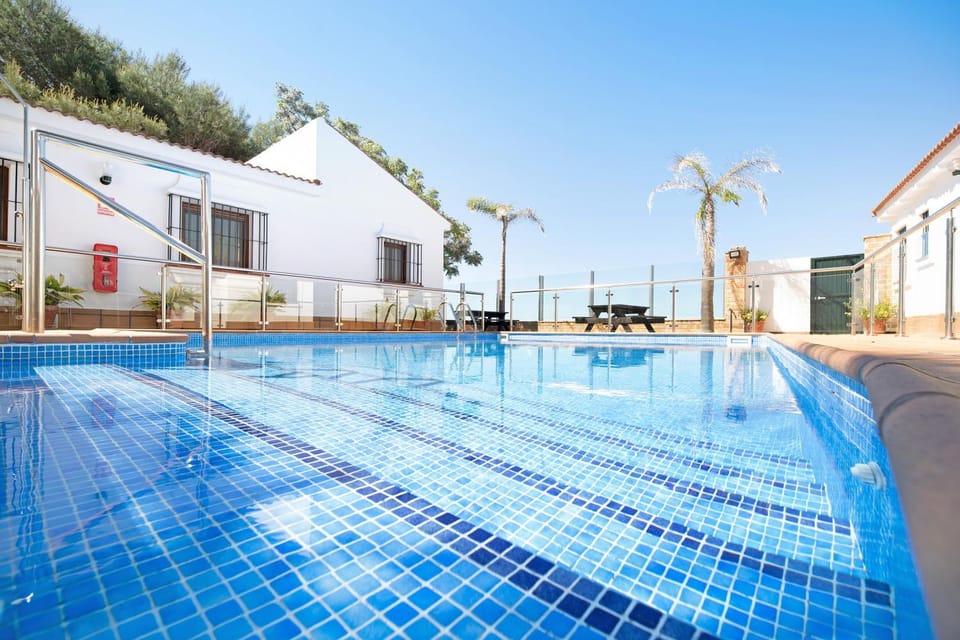 Property building, Living room, Swimming pool