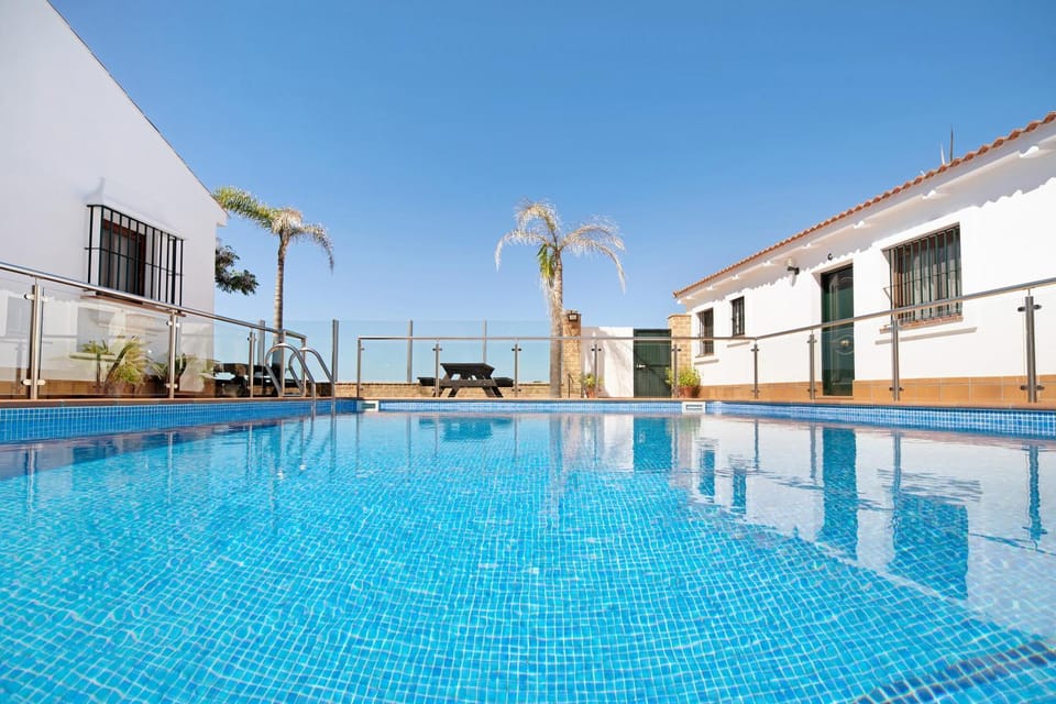 Property building, Living room, Swimming pool