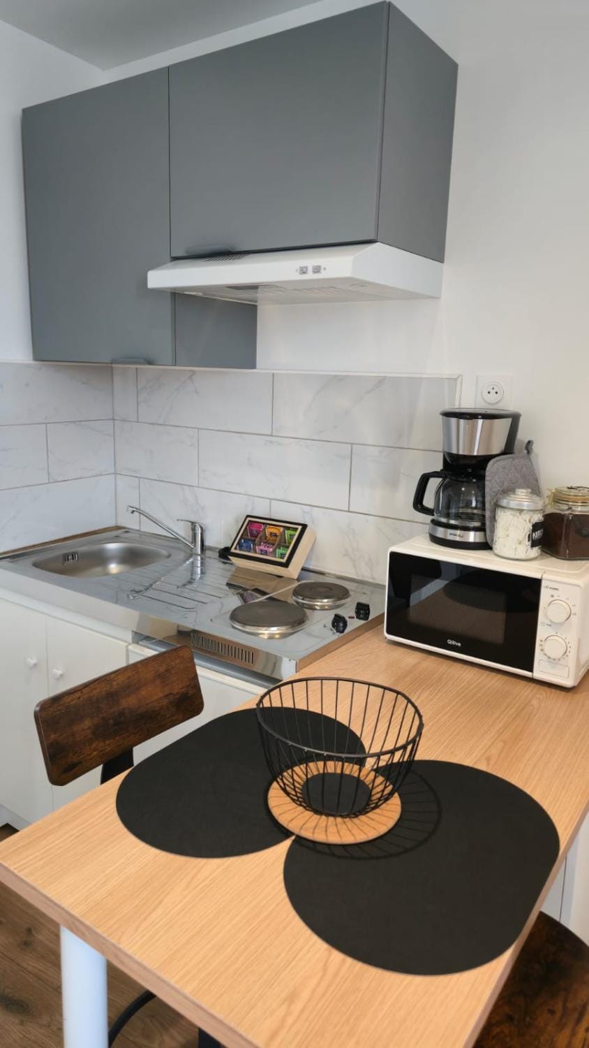 Kitchen or kitchenette, stove