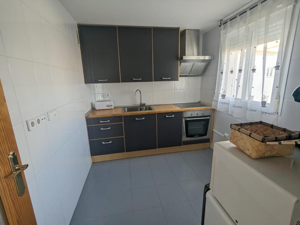 Kitchen or kitchenette, oven, stove