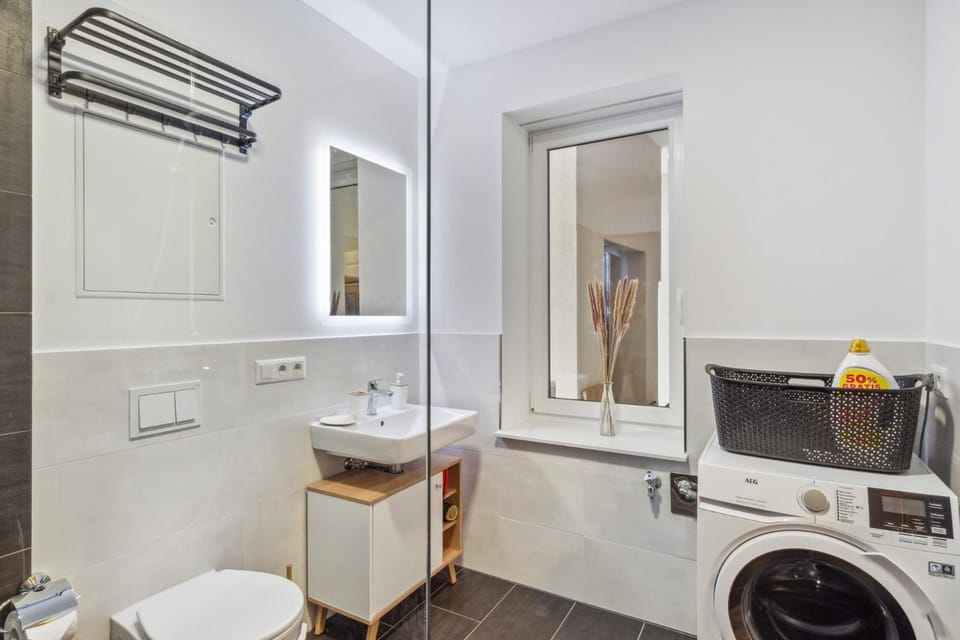 Shower, Toilet, Bathroom, towels, washing machine, dryer