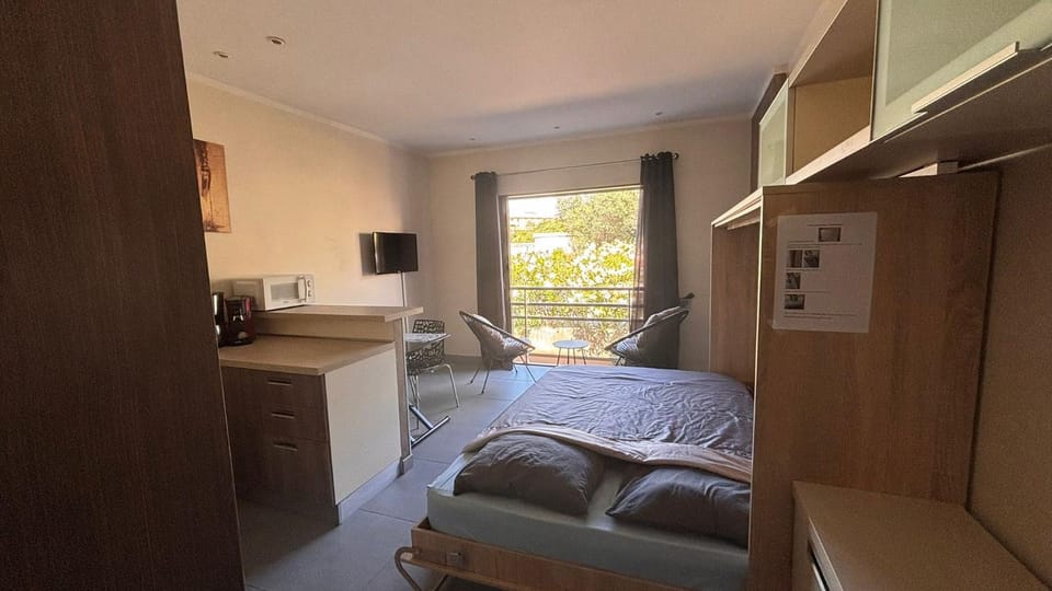 Studio climatisée dans résidence à 5 minutes des plages a pied Apartment in Propriano