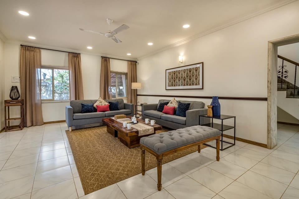 Property building, Living room, Seating area, Pool view, fireplace