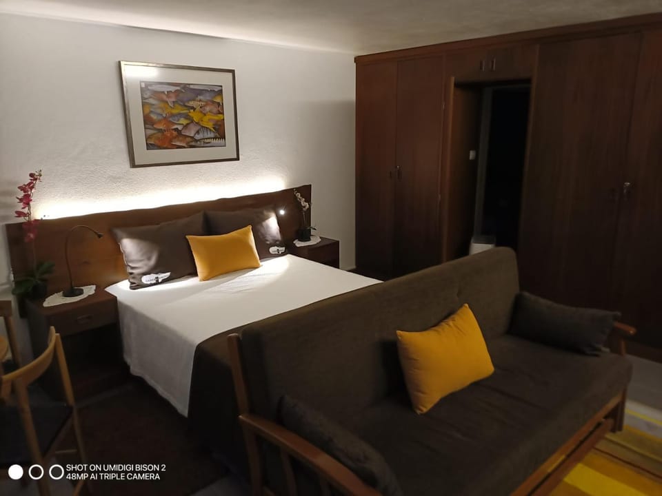Bed, Seating area, Bedroom, wardrobe
