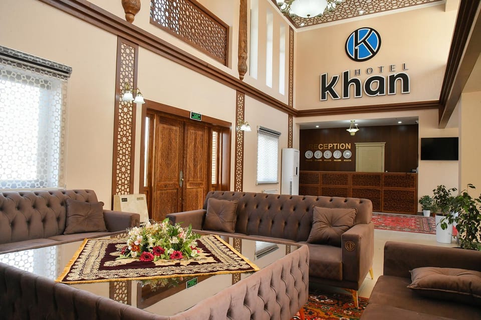 Property logo or sign, TV and multimedia, Living room, Seating area, Logo/Certificate/Sign, Text overlay, Certificate/Award