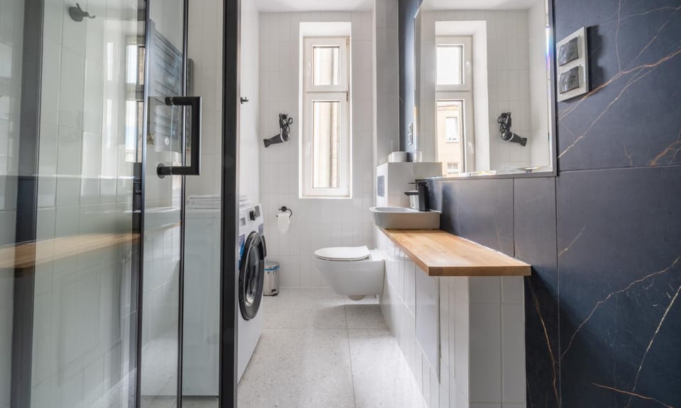 Toilet, Bathroom, towels, washing machine, dryer