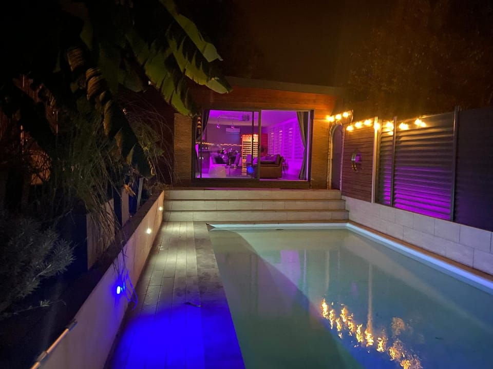 Property building, Night, Pool view, Swimming pool