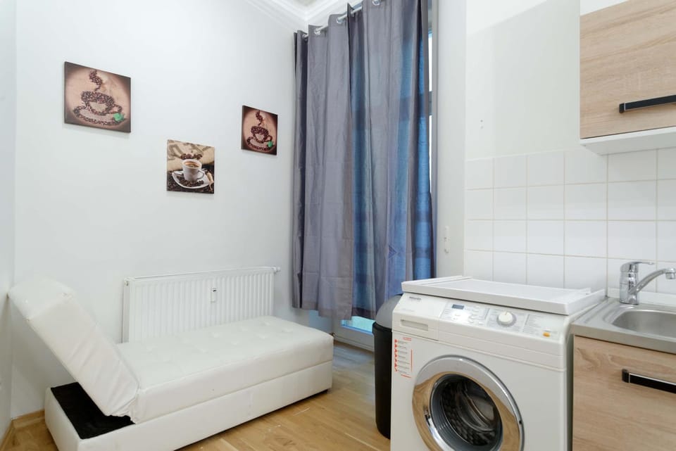 Kitchen or kitchenette, washing machine