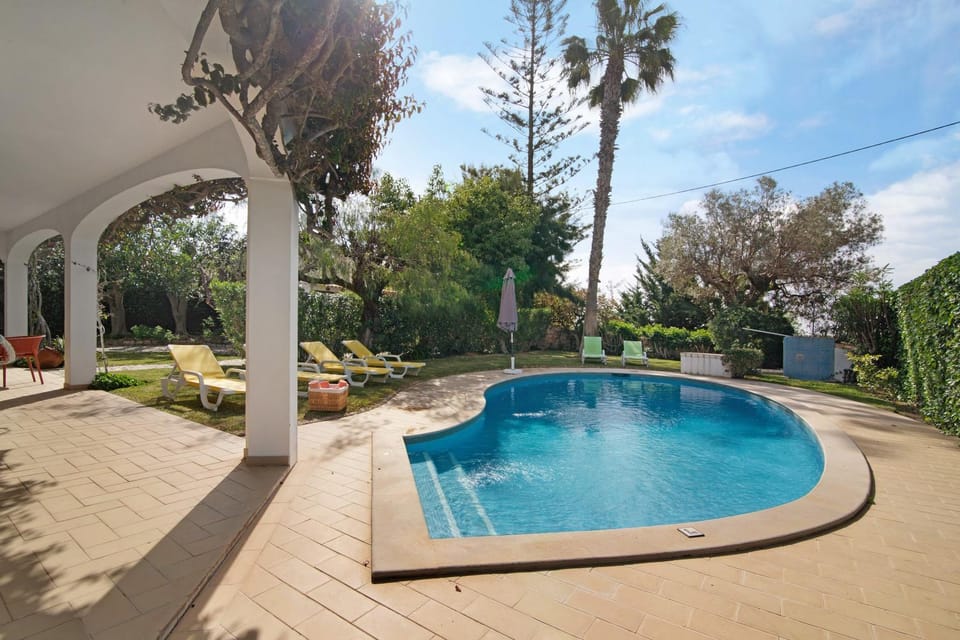 Property building, Living room, Swimming pool