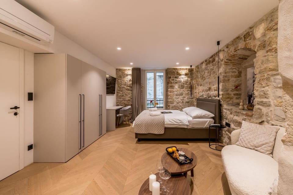 Photo of the whole room, Seating area, Bedroom, towels, wardrobe, air conditioner