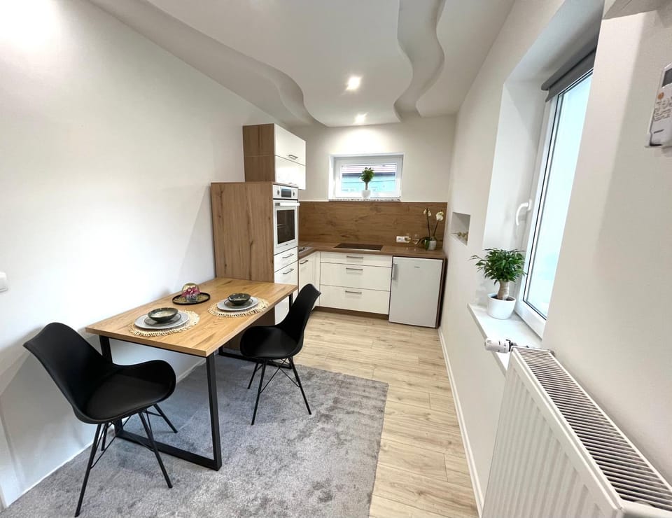 Kitchen or kitchenette, Seating area, Dining area, oven, stove, kitchen