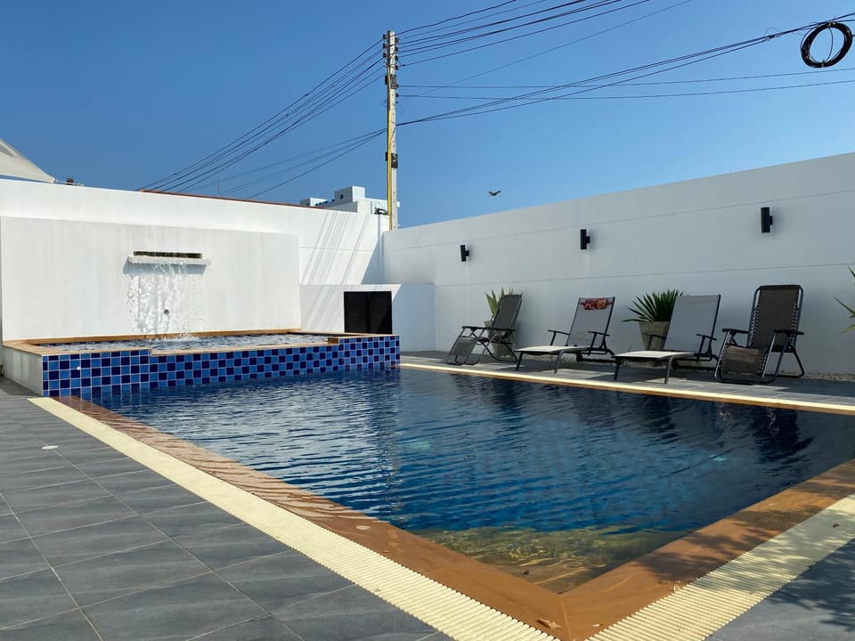 Swimming pool, sunbed