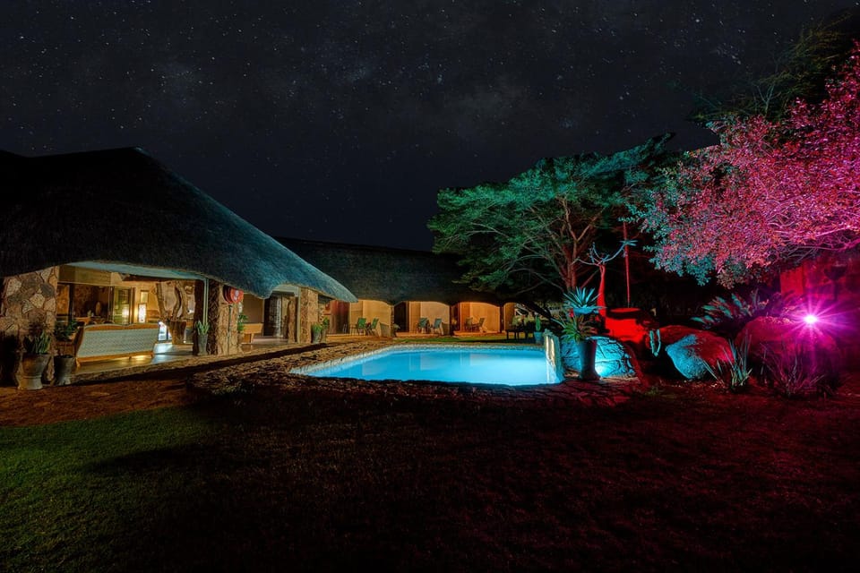 Property building, Night, Swimming pool
