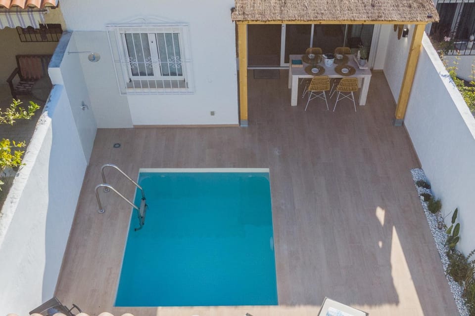 Property building, Living room, Swimming pool