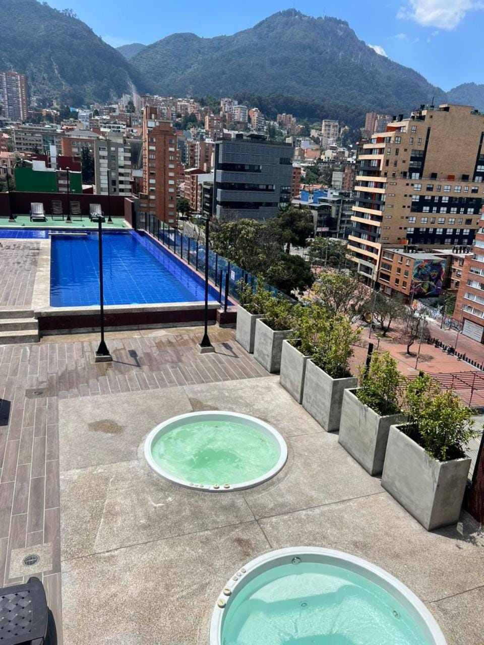 Property building, Nearby landmark, Day, Natural landscape, City view, Mountain view, Pool view, Swimming pool