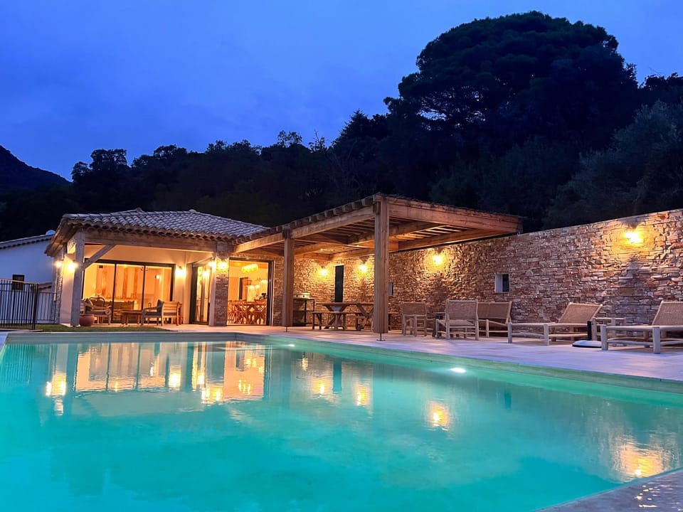 Property building, Night, Natural landscape, Mountain view, Pool view, Swimming pool, sunbed