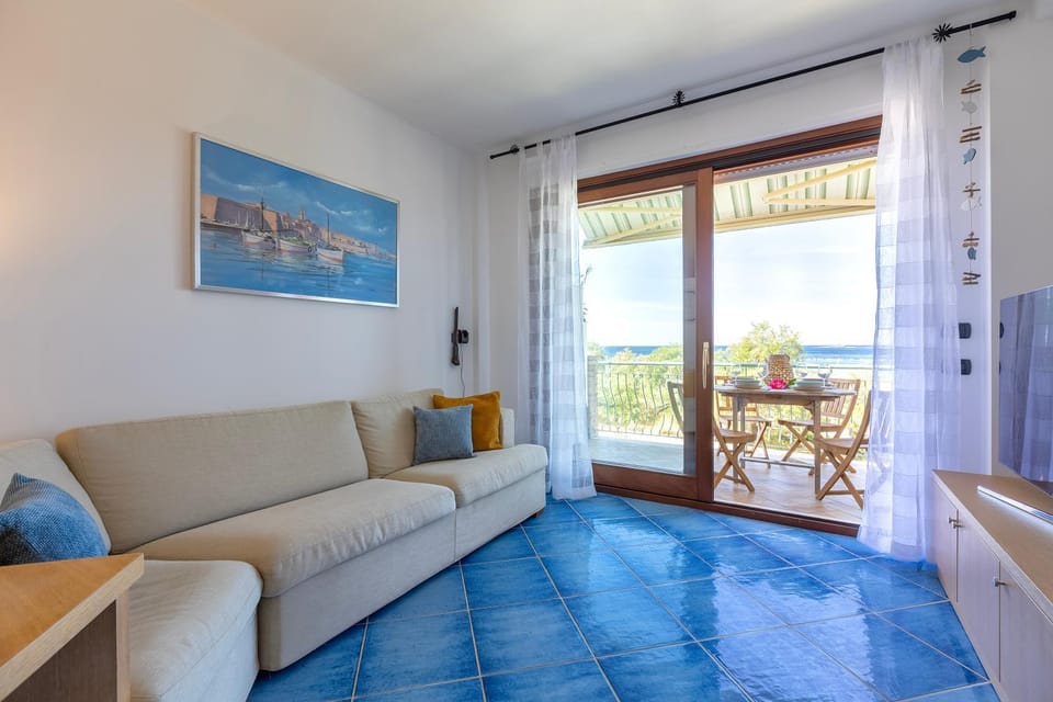 Natural landscape, View (from property/room), Balcony/Terrace, Living room, Seating area, Dining area, Sea view, air conditioner