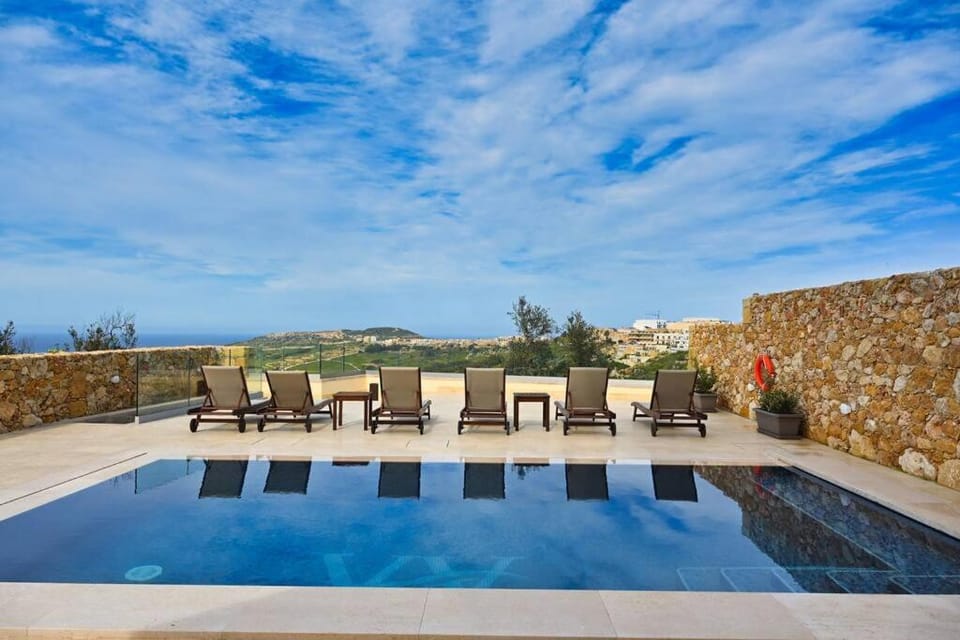 Patio, Natural landscape, Pool view, Swimming pool, sunbed