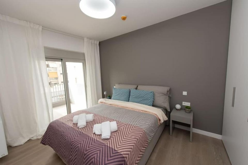 Bed, Photo of the whole room, Bedroom, towels, wardrobe