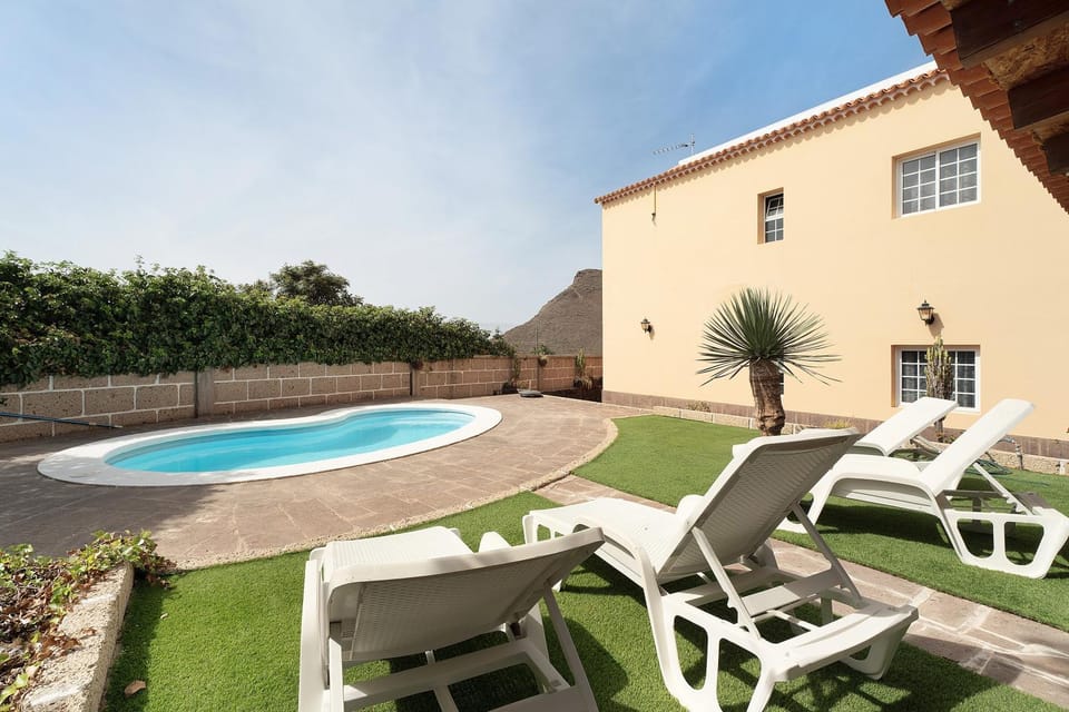 Property building, Living room, Swimming pool