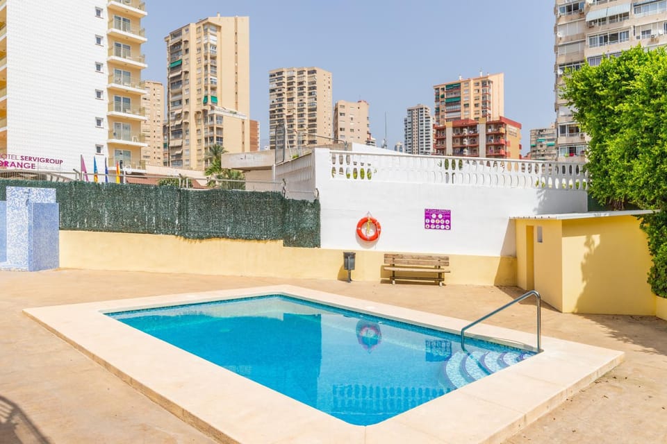 Property building, Living room, Swimming pool