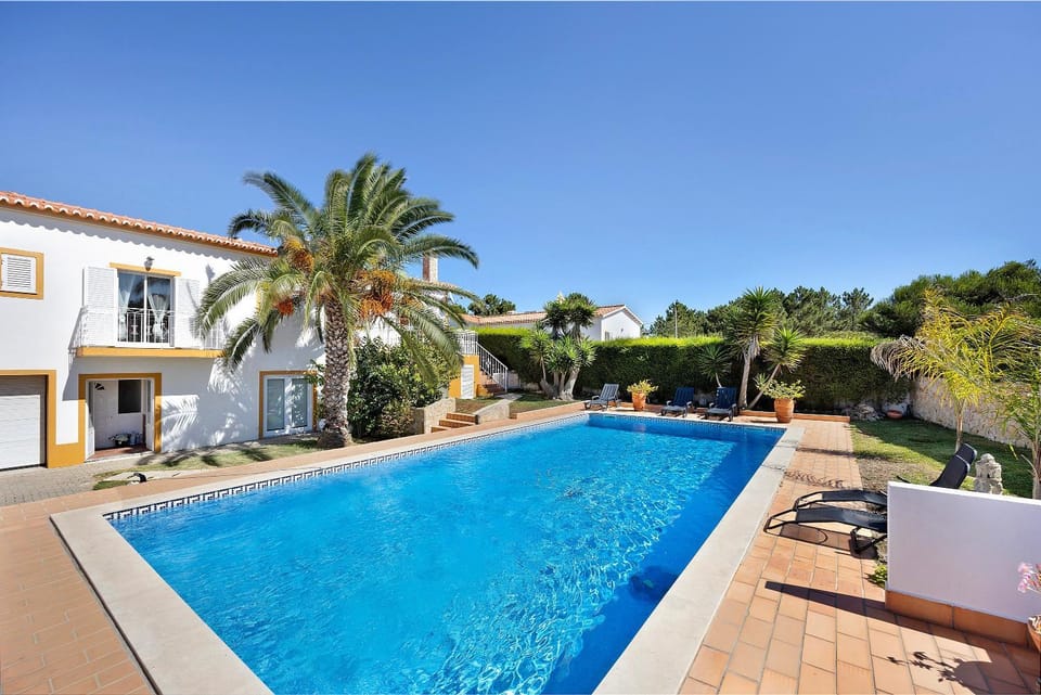 Property building, Living room, Swimming pool