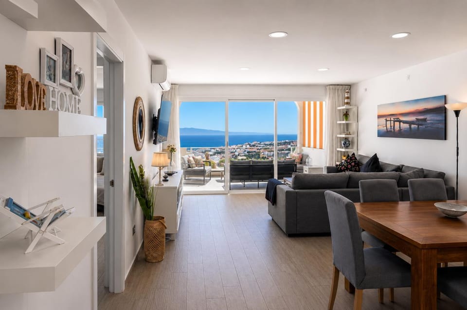 Natural landscape, TV and multimedia, Living room, Seating area, Dining area, Mountain view, Sea view