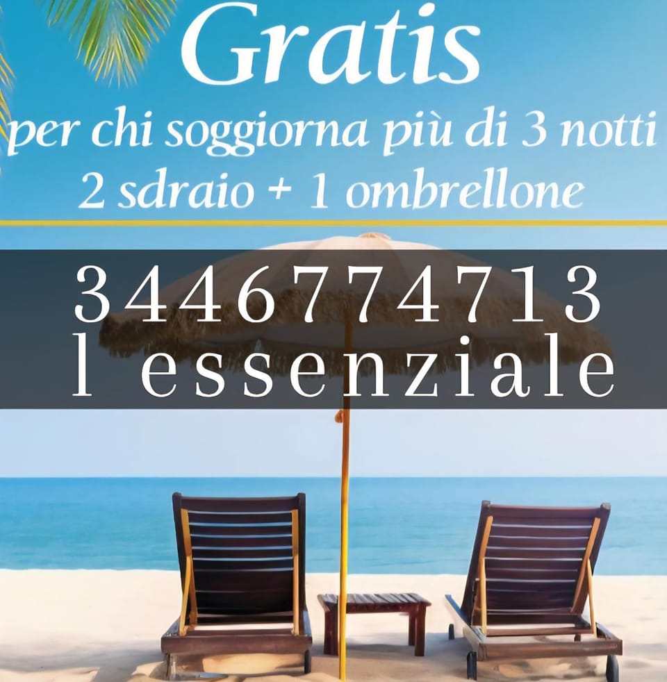 Property building, Day, Natural landscape, Beach, Text overlay, Sea view