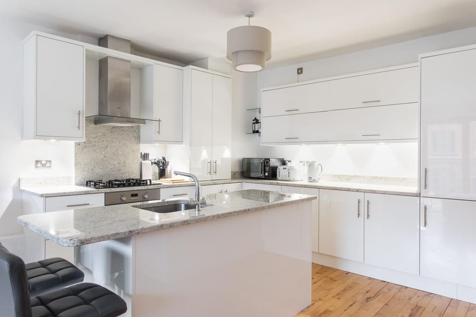 Kitchen or kitchenette, stove, toaster