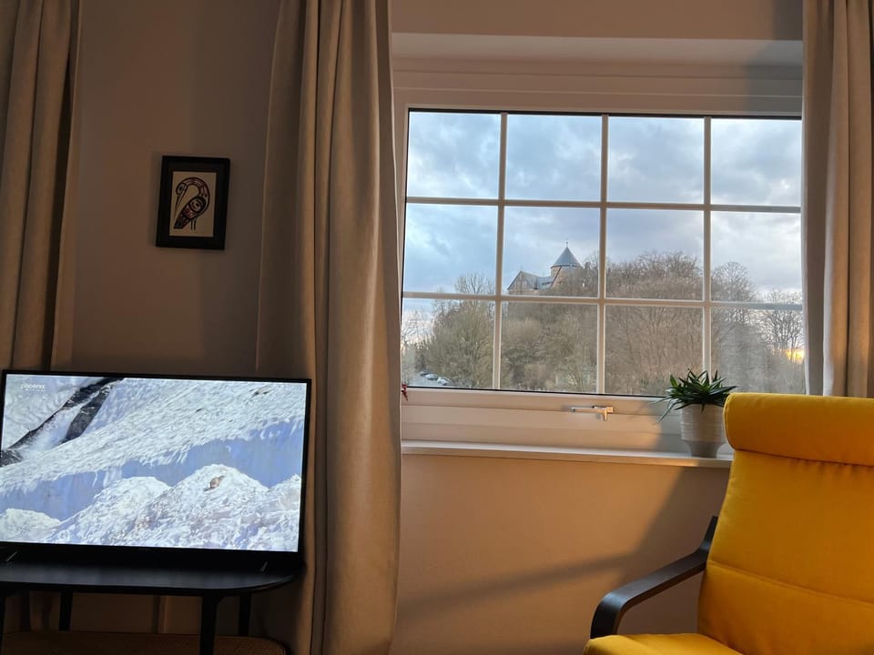 View (from property/room), Living room, Landmark view, Sunset