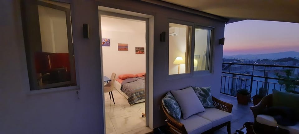 Night, View (from property/room), Balcony/Terrace, Living room, Seating area