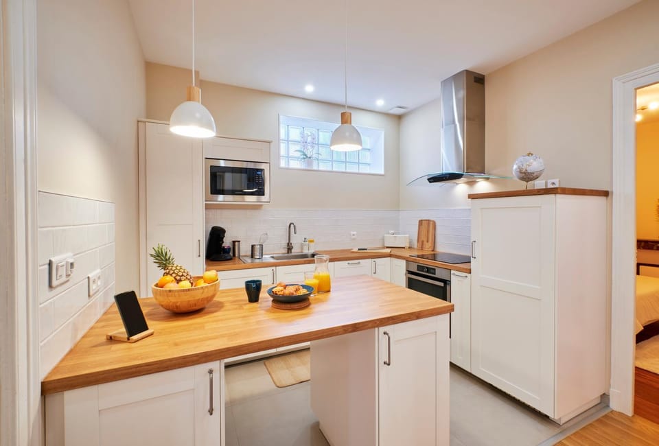 Kitchen or kitchenette, dishwasher, oven, stove, toaster