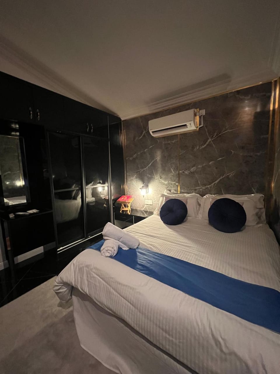Bed, Bedroom, towels, air conditioner