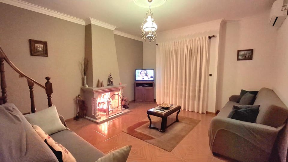 Communal lounge/ TV room, fireplace