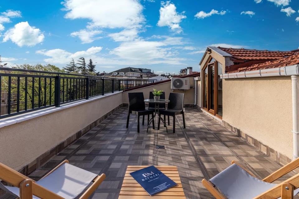 Property building, Patio, Day, View (from property/room), Balcony/Terrace, Living room, Seating area, Dining area