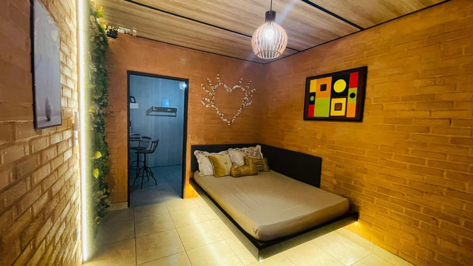 Suite inteligente com integração com alexa- cama flutuante - área central de GV- casais- indivudual Apartment in Governador Valadares