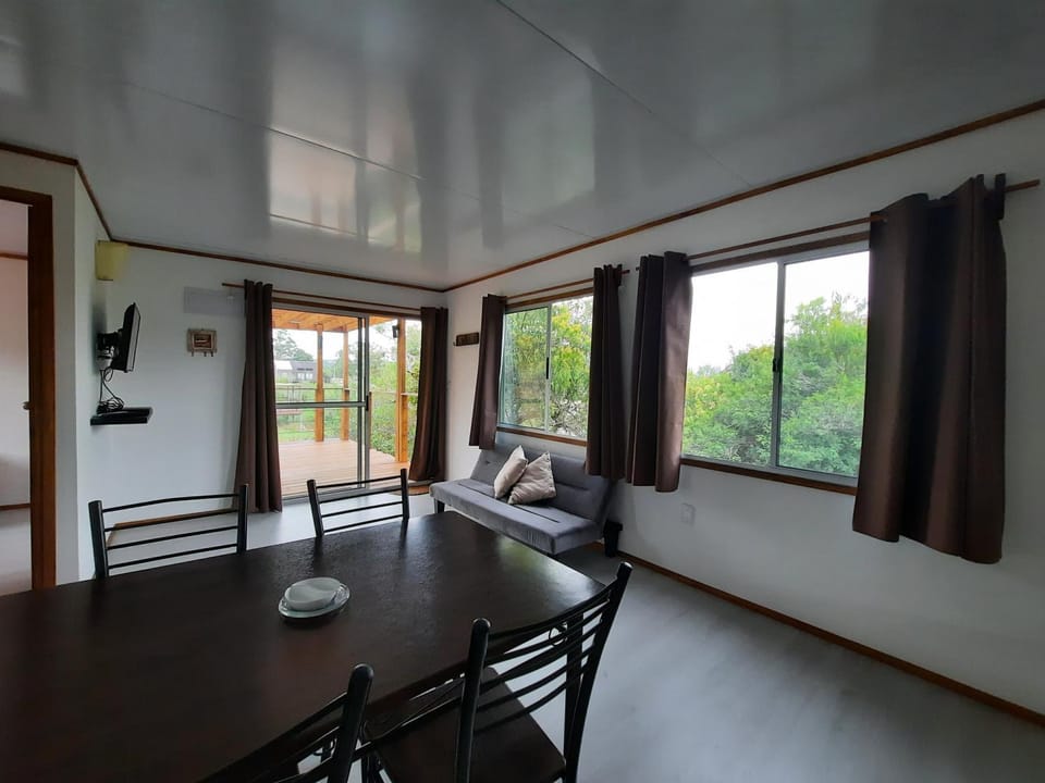 View (from property/room), Living room, Seating area, Dining area