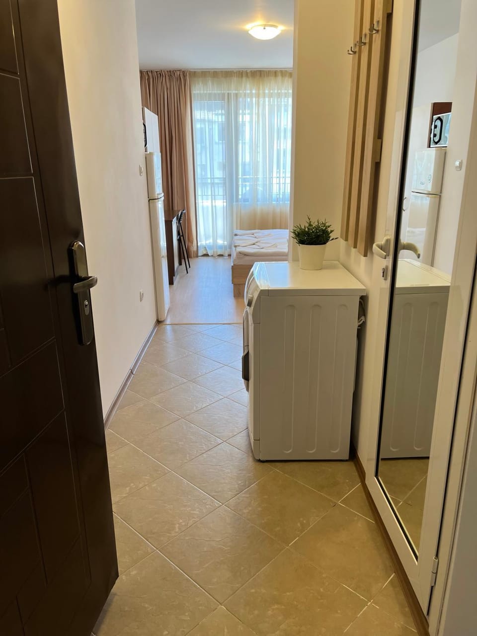 Photo of the whole room, washing machine