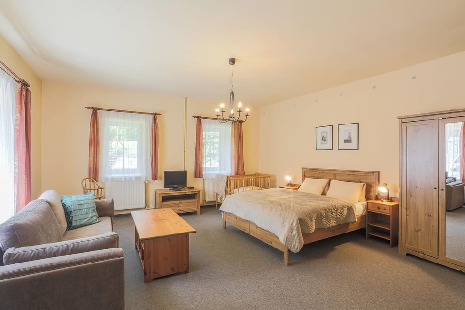 Communal lounge/ TV room, Seating area, Bedroom, cot