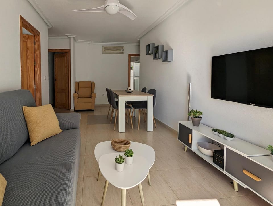TV and multimedia, Living room, Seating area, fireplace, air conditioner