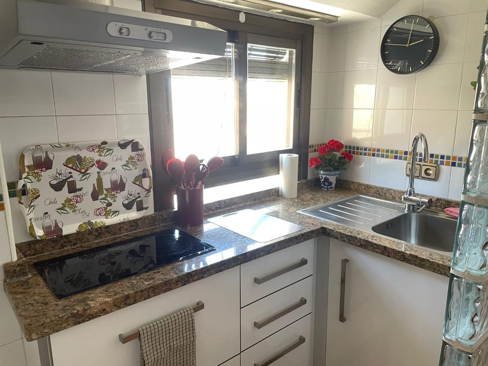 Kitchen or kitchenette, stove