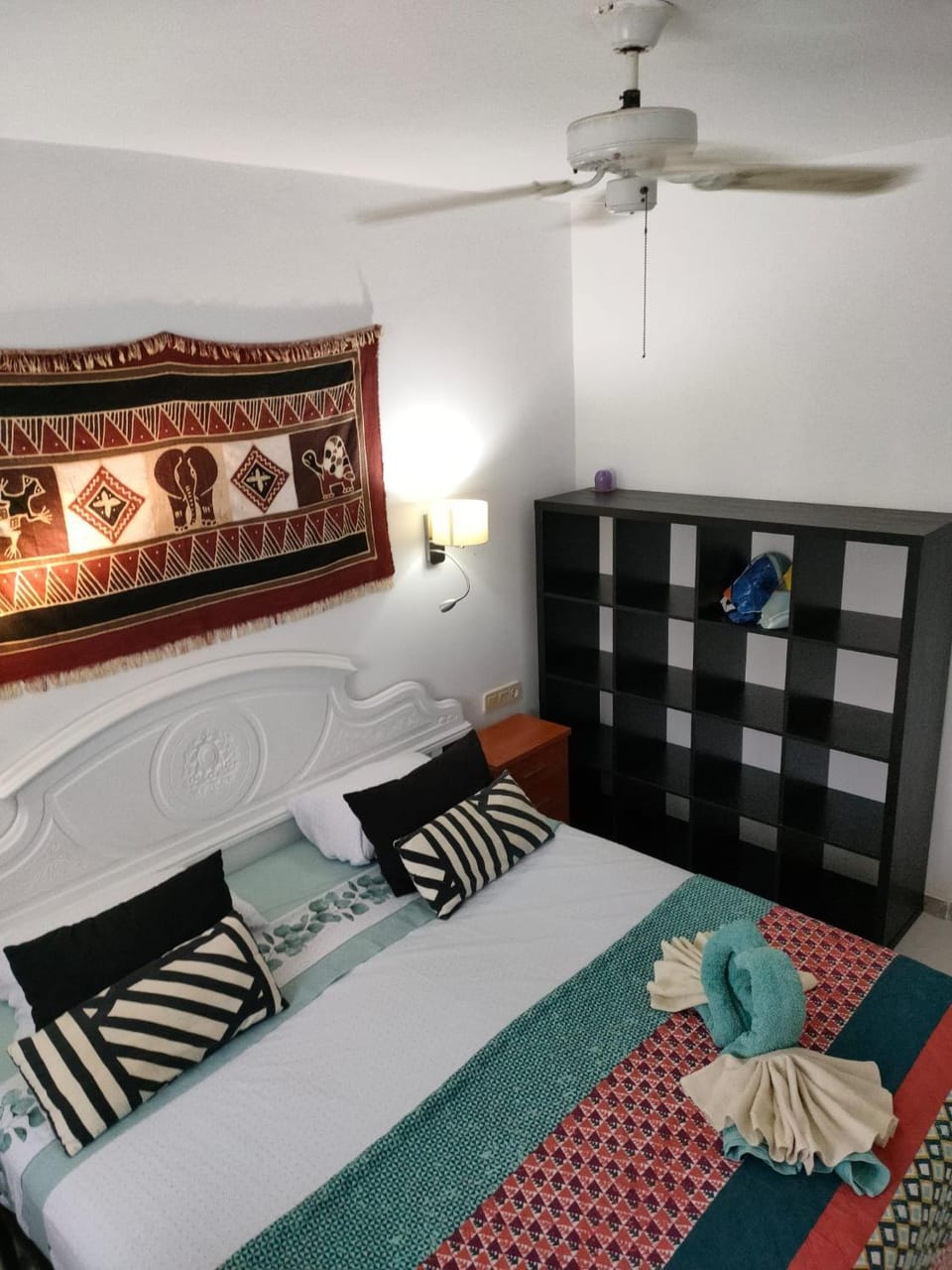 Bed, Night, Photo of the whole room, Bedroom, fireplace, furniture, storage, towels