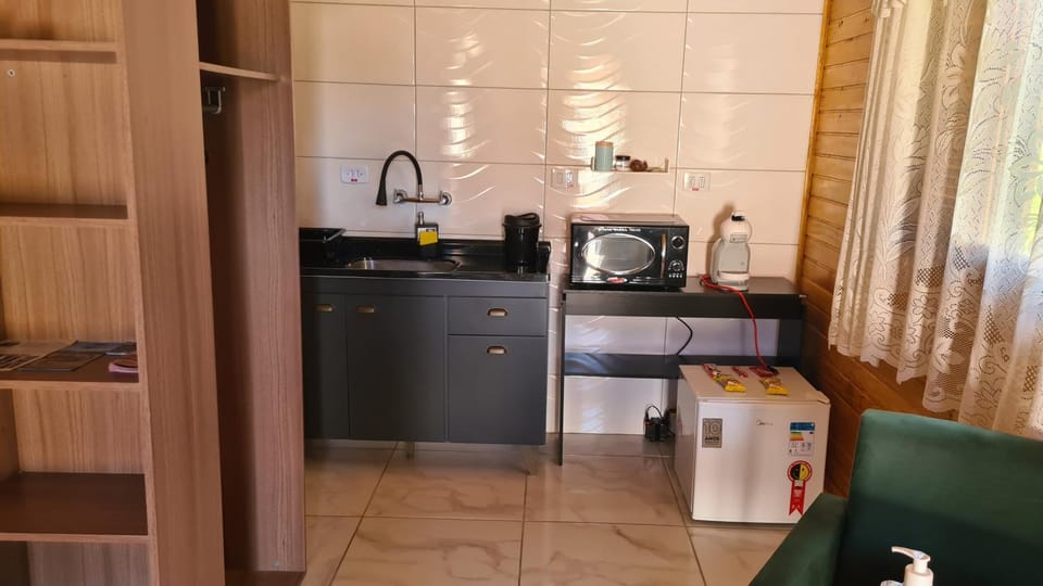 Coffee/tea facilities, Kitchen or kitchenette, minibar, oven, toaster